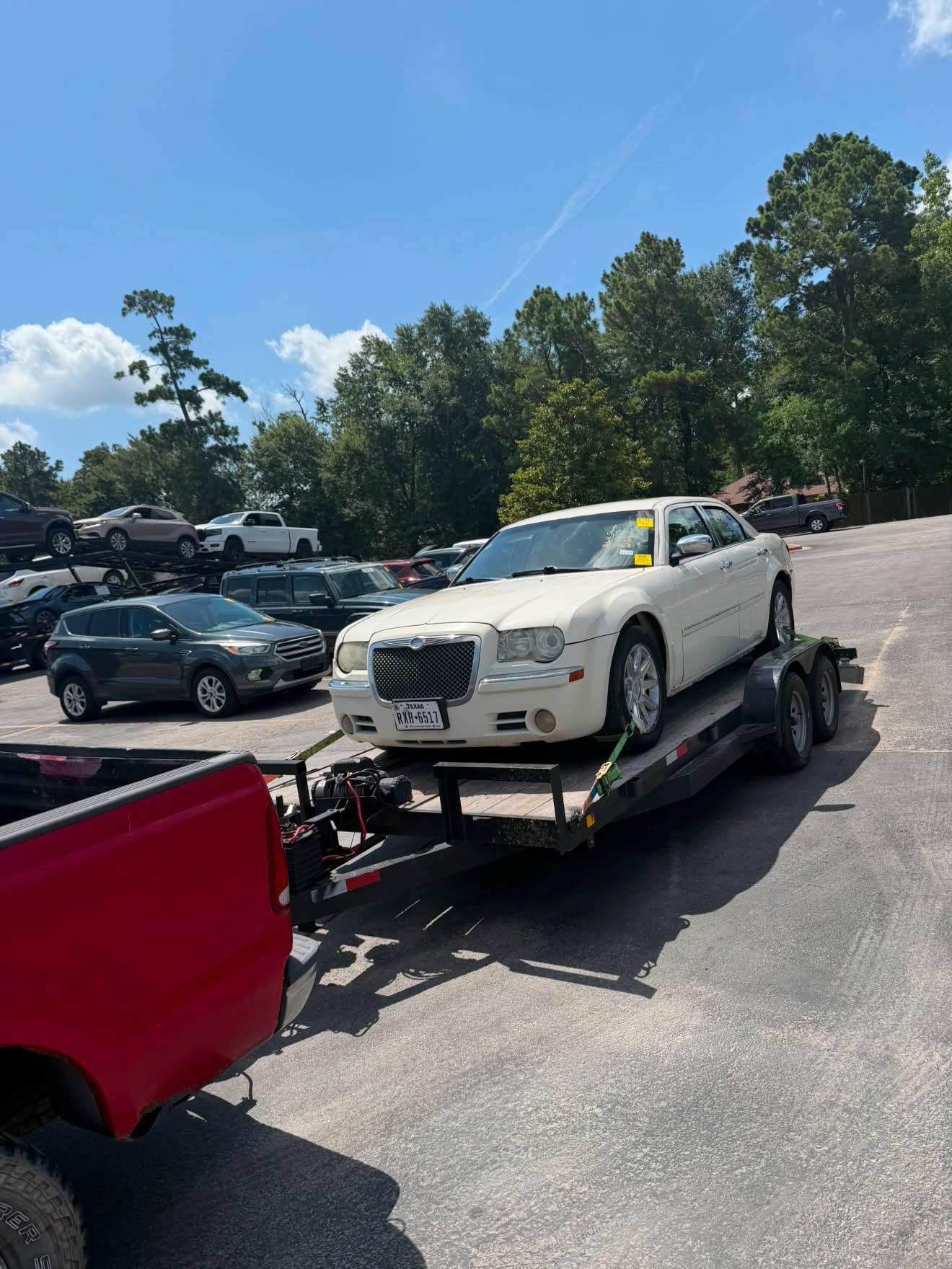 Chrysler 300 transported on a Masterkey Transport trailer in Houston, Texas
